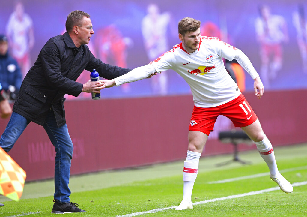 Leipzig's Timo Werner, right, gestures to his head coach Ralf Rangnick, left, after scoring his side's 2nd goal during the German Bundesliga